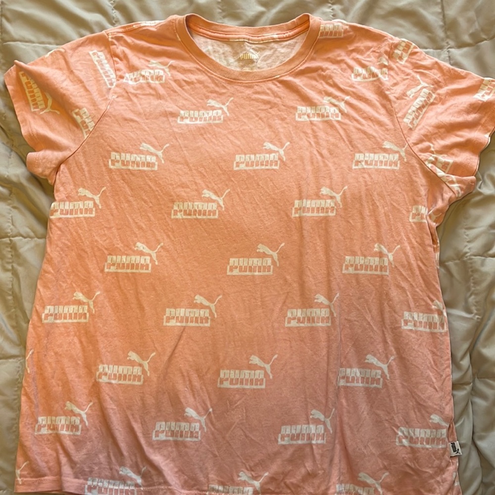 Peach colored puma shirt. Size XL but fits more like a L.